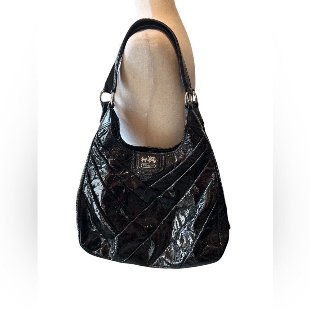 Black patent leather purse.